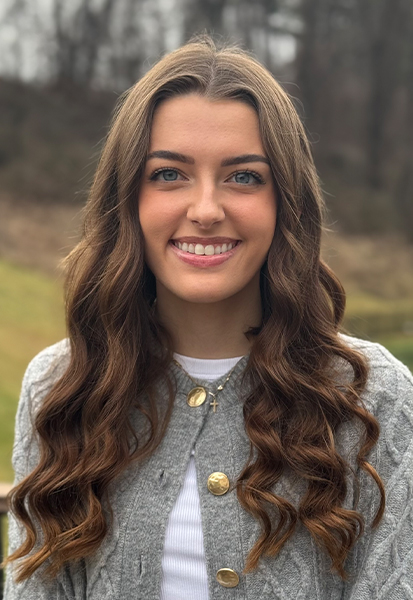 a woman smiling for the camera