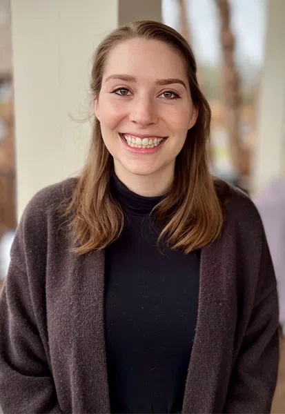 a woman smiling for the camera