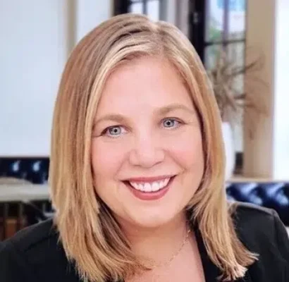 a woman smiling for the camera