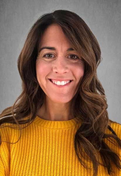 a woman smiling for the camera