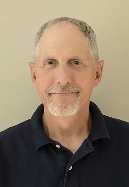 a man smiling for the camera