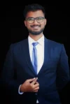 a man wearing a suit and tie