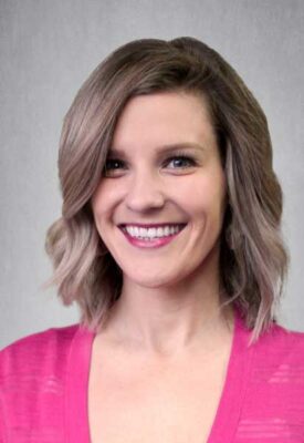 a person smiling for the camera