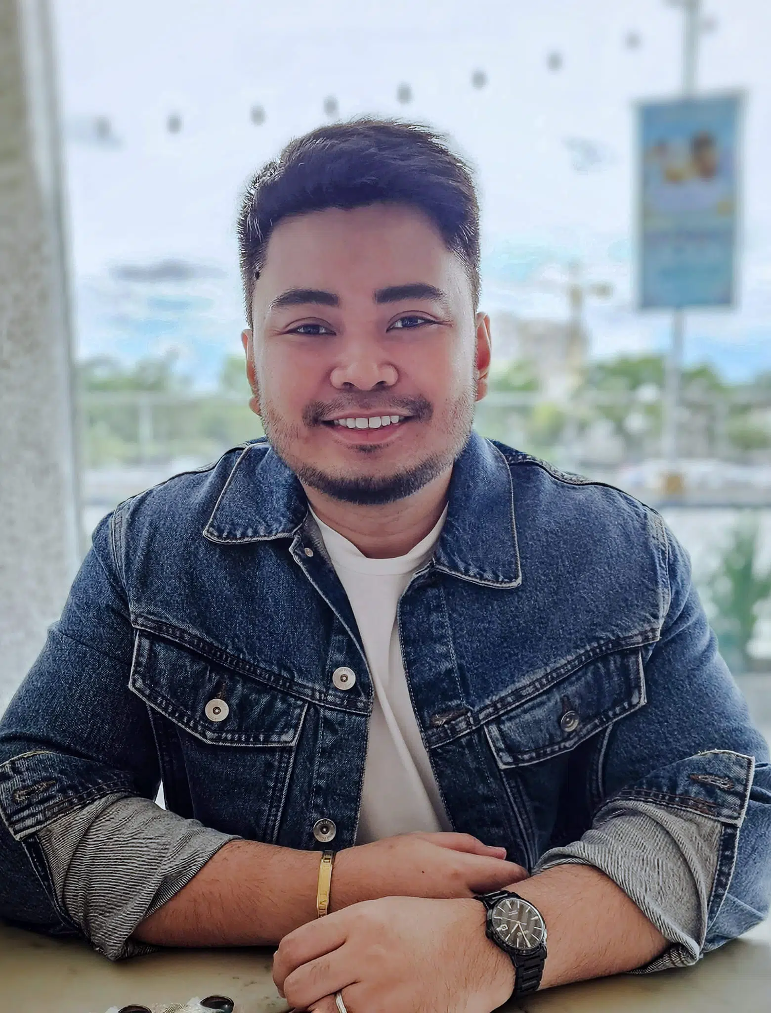 a man smiling for the camera