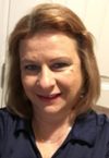a woman smiling for the camera